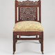 A brass and teak Lockwood de Forest chair made circa 1882-1885.
